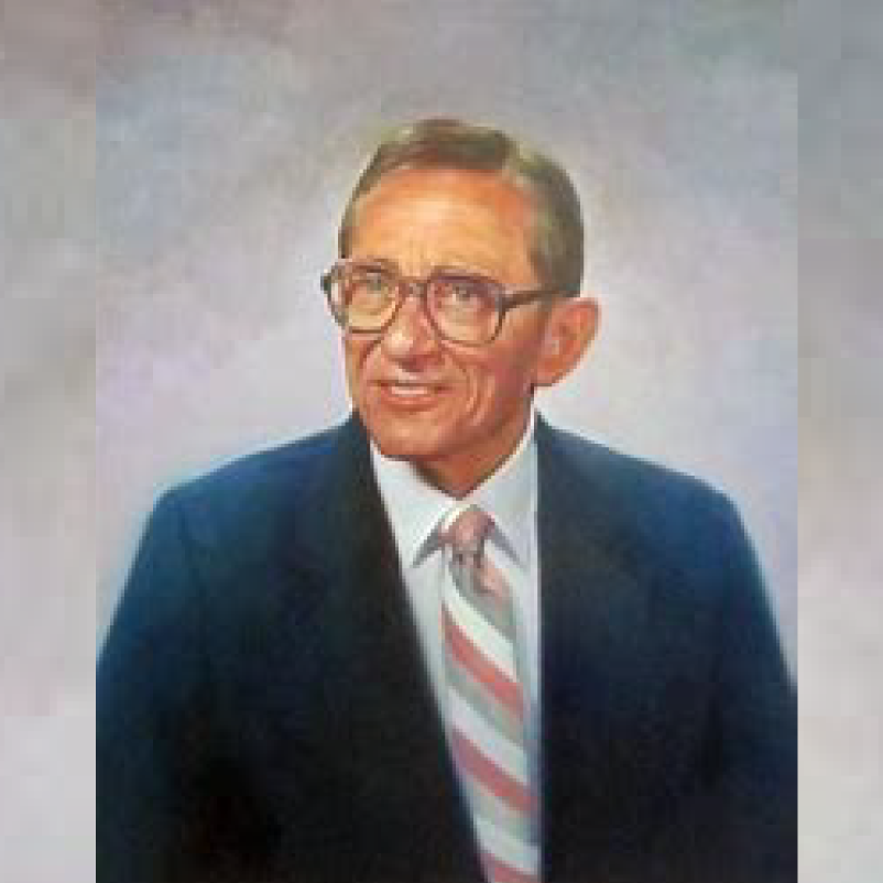 Oil painting of Wendell G Hardway in a navy suit coat, striped tie, and pale blue shirt